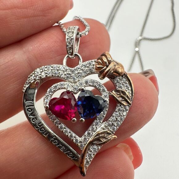 NIB Sterling silver, possibly gold plated, heart necklace with cz diamonds!